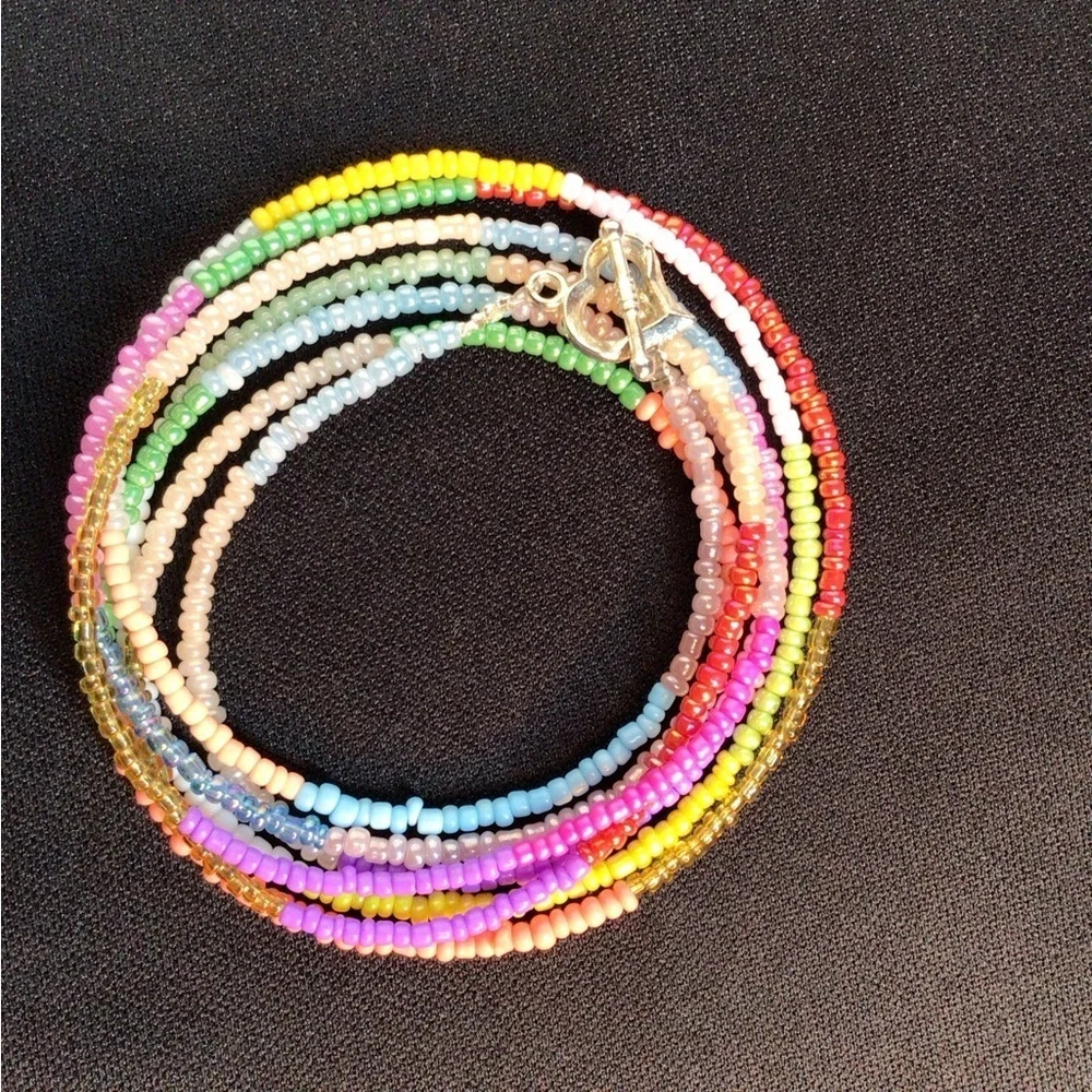 Multi-Colored Multi-Strand Glass Beaded Necklace, Bracelet, & Earring Set.